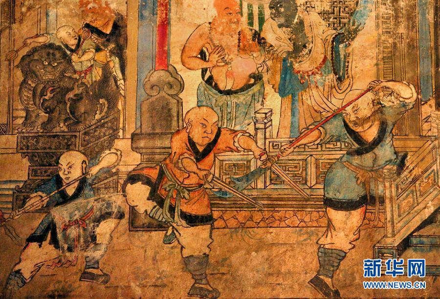 少林寺白衣殿內(nèi)的墻上表現(xiàn)少林武僧習(xí)武練拳的壁畫(局部,2005年9月15日攝)。